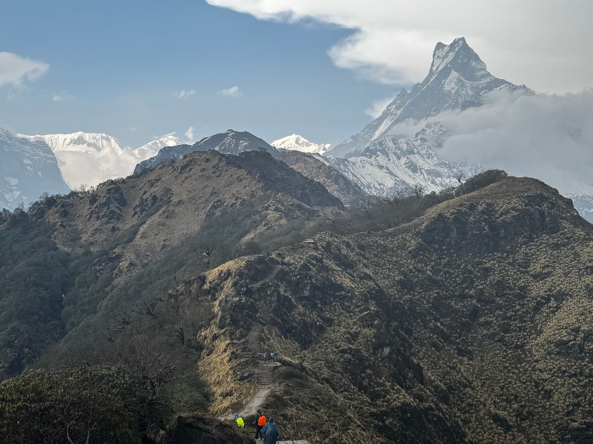 Machhapuchhre (Fishtail) towering over the Mardi Himal ridge as trekkers approach